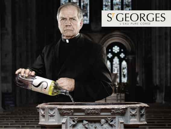 St Georges face a so pubba cun l'abbé vide-eau
