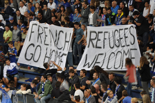 In Furiani : "French go home - refugees welcome"