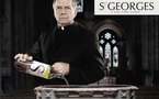 St Georges face a so pubba cun l'abbé vide-eau